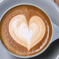 Cappuccino (8Oz) · a double shot of espresso and steamed milk
