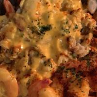 Shrimp And Crab Fries · Seasoned fries loaded with Shrimp, Crab Meat, Special Cheese Sauce.