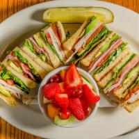 # 1 Club Sandwich · Ham, turkey, bacon, avocado, lettuce, tomato and mayonnaise on your choice of bread.
