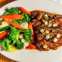 Tri-Tip Platter · A generous portion of marinated and grilled tri-tip topped with a mushroom, tomato, shallots...