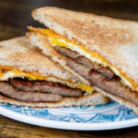 Yummy Food Time Sausage, Egg & Cheese · 5oz of locally produced Yummy Food Time Bourbon Maple Breakfast Sausage, fried egg, your cho...