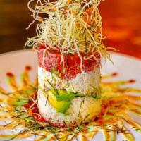 Salmon Or Tuna Tower · Spicy salmon or spicy tuna, crab mix, avocado, sushi rice, masago, sesame seeds, seaweed, fi...