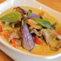 Green Curry · With eggplant, green beans, carrot, peas, bell pepper, and basil.