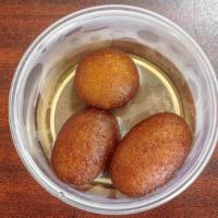Gulab Jamun · Homemade deep fried cottage cheese balls in honey and rose water syrup.
