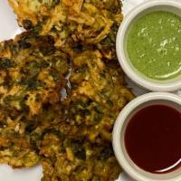 Pakora · Vegetables dipped in chickpeas flour and deep fried.