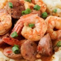 Shrimp And Grits · Shrimp sautéed in a creole seasoning over fluffy buttered grits.