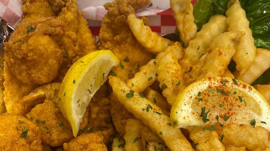 The 3+10 · Three pieces of New Orleans fried catfish and ten cajun shrimp. Served with fries, hushpuppies, and a salad.