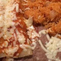 Enchiladas Rojas · Three enchiladas (1 beef, 1 Chicken, 1 Cheese) topped with red sauce, served with rice and b...