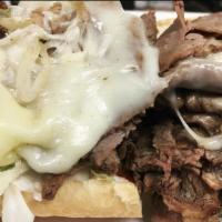 French Dip · Six ounces of homemade tender roast beef on an amoroso sub roll with melted provolone, onion...