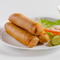 Veggie Spring Roll · Deep fried rolls with carrot, onion, cabbage, vermicelli, sweet and sour sauce.