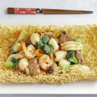 Crispy Egg Noodles Combination · Shrimp, scallop, calamari, chicken, beef, white onion, bamboo, broccoli, baby corn, mushroom...