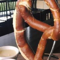Town Twist W/ Queso · Giant Bavarian pretzel served with queso.