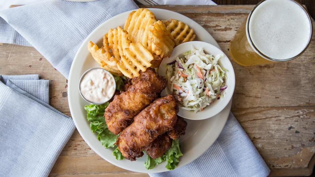 Fish & Chips · Cod fried in house-made boulevard wheat batter, slaw, house-made tartar sauce, served with waffle fries and coleslaw.