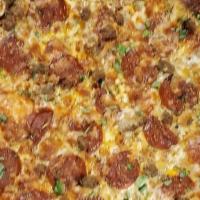 Supreme · House pizza sauce, house white cheese blend, pepperoni, Italian sausage, ground beef, ham, b...