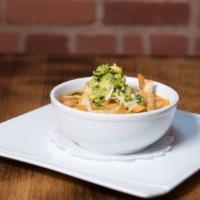 Chicken Tortilla Soup · Chicken Tortilla Soup- Chicken, vegetable broth, fresh guacamole, cheese, and crispy tortill...