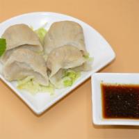 Steamed Or Pan Fried Dumplings (4) · With napa cabbage, veggie-chicken, shiitake mushrooms and bean thread noodles.