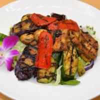 Grilled Vegetable Salad · Grilled flavored organic tofu, eggplant, zucchini, asparagus, red bell peppers, yellow squas...