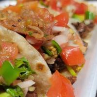 Taco De Carne Asada · Taco con carne asada a la parrilla con tortilla de harina