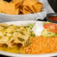 Enchiladas Verdes · 3 chicken or beef enchiladas. Topped with green tomatillo sauce, shredded cheese, lettuce an...