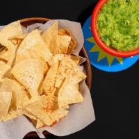 Chips And Guacamole · Tortilla chips with housemade fresh guacamole.