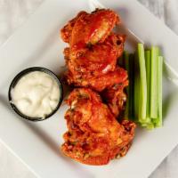 Crispy Ale House Wings · Celery, blue cheese. Tossed in choice of: buffalo, old bay, barbecue, garlic Parmesan, smoke...