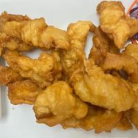 Chicken Fingers · Chicken in a light tempura batter and fried to a golden brown. Served with sweet and sour sa...