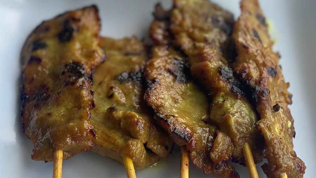 Satay Beef · On the skewers, beef coated with coconut milk, grilled and served with our curry peanut sauce.