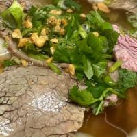 Pho · Rice noodles submerged in our fragrant beef broth served with sliced beef and meatballs. Top...