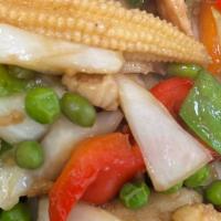 Baby Corn · Stir fried baby corn with mushrooms, onions and scallions.