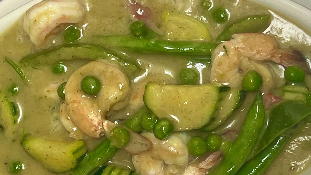 Green Curry · Curry with Thai basil, green peas, red peppers, green peppers, snow peas, green zucchini, and string beans.