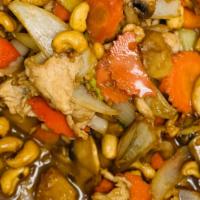 Chicken With Cashew Nut · Tender chicken sautéed with cashew nuts, onions, pineapples, mushrooms and scallions in hous...
