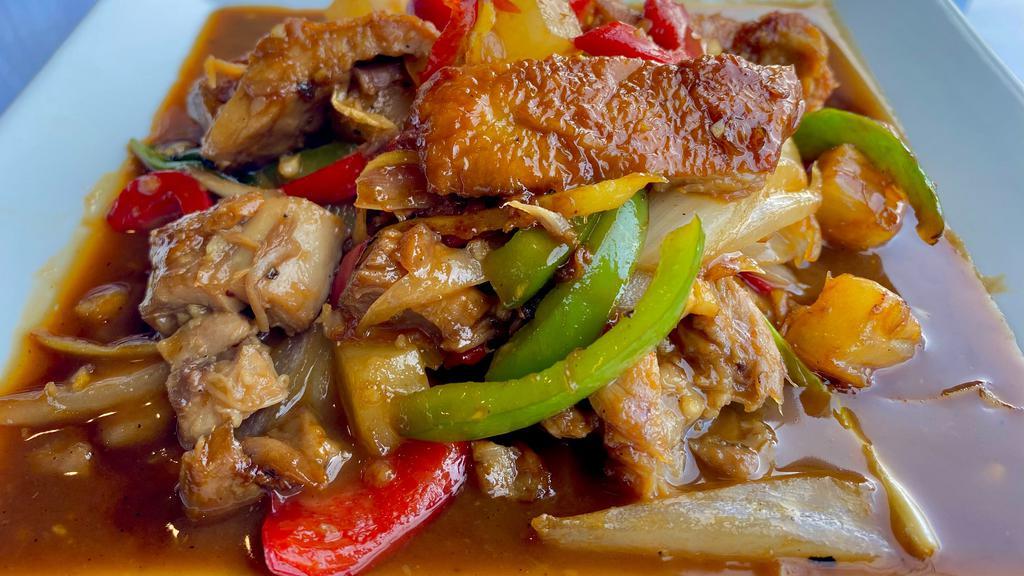 Tamarind Duck · Boneless duck with onions, green peppers, ginger pineapples and sprinkling of scallions.
