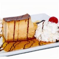 Flan · Delicious homemade custard with a touch of coconut and topped with thin caramel sauce and wh...