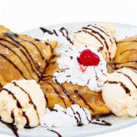 Sopapillas · Fluffy pasties lightly fried, topped with pure honey, powdered sugar and cinnamon, ice cream.