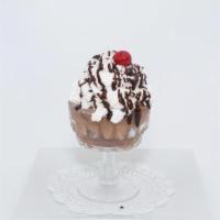 Chocolate Mousse · Our creamy homemade chocolate mousse, topped with whipped cream and a cherry.