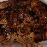 Pulled Pork · Tender and  moist pulled pork seasoned to perfection served with choice of 2 sides.