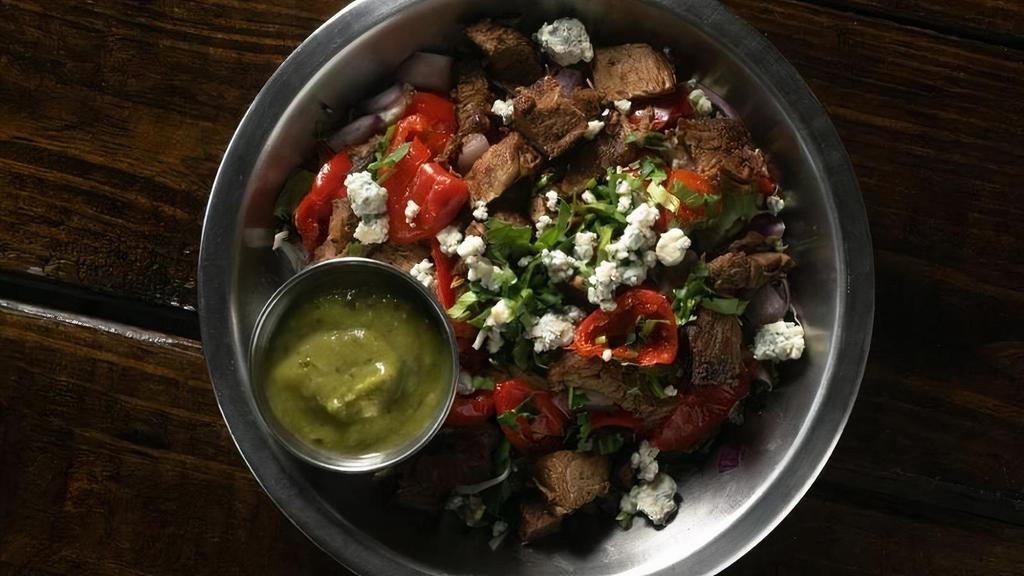 Half Steak Salad · Romaine, Arugula, Red and Green Cabbage, Blue Cheese Crumbles, Red Onion, Peppadew Peppers, Cliantro, Avocado Jalapeño Dressing