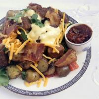 Veggie Loaded Breakfast Home Fries:Roasted Peppers, Mushrooms, Veggie Salami, Swiss Cheese, Green Onions, Cilantro, And Hollandaise Sauce. Served With Thai Chili Ketchup. · Veggie Loaded Breakfast Home Fries:Roasted peppers, mushrooms, veggie salami, swiss cheese, ...