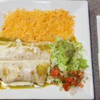 Burritos De Carne Asada · Two burritos stuffed with flank steak, topped with cheese and green tomatillo sauce, lettuce...