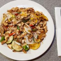 Arroz Con Pollo · Grilled chicken cooked with zucchini, red and yellow peppers, pineapple, served over a bed o...