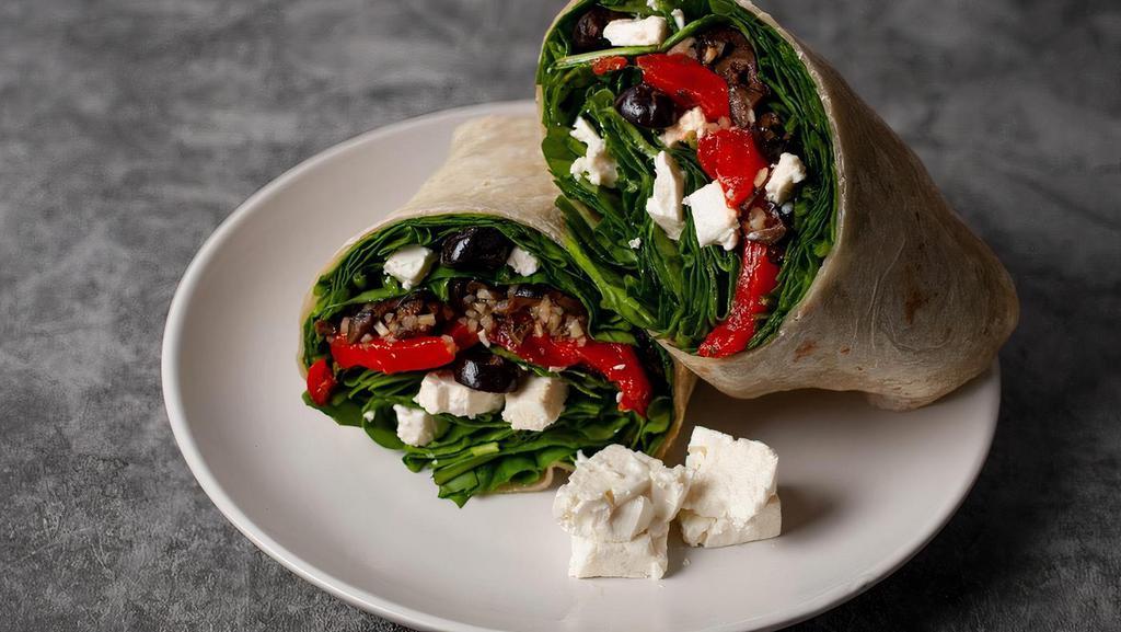 Greek D-Liter · Fresh chopped garlic, feta cheese, fresh baby spinach, black olives, and roasted red peppers.