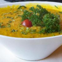 Daal Tadka · Yellow lentils cooked in mild spices.