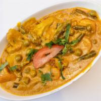 Vegetable Korma · Combination of mildly spiced mixed vegetables cooked in yogurt sauce, spices and cashews.