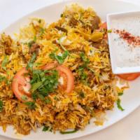 Lamb Biryani · Basmati rice, dry fruits, nuts, and pieces of lamb richly flavored with saffron and cooked w...