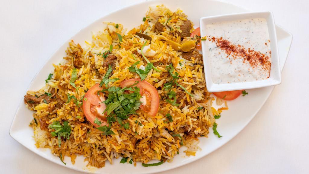 Lamb Biryani · Basmati rice, dry fruits, nuts, and pieces of lamb richly flavored with saffron and cooked with fine herbs on a low heat.
