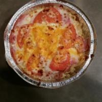 Baked Alfredo (Full) · Fettuccine pasta with alfredo sauce, ham, tomatoes and American cheese.