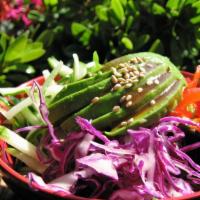 Garden Salade · Organic spring mix, avocado, red bell peppers, red cabbage and carrots with sesame seeds,  a...