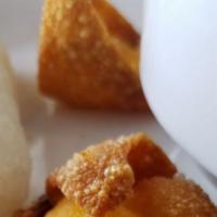Crab Rangoons (5) · Deep fried wonton skins stuffed with crab meat and cream cheese.