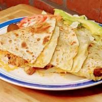 Quesadillas (10'') · Flour or corn tortilla stuffed with mozzarella cheese cilantro, onions, and your choice of m...
