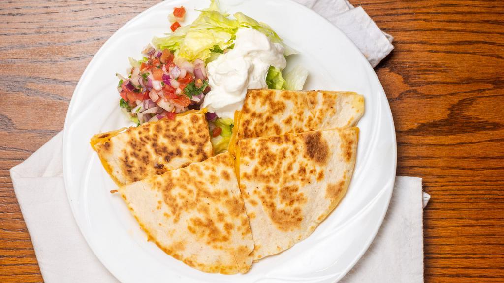 Quesadilla Combo 2 · Combo of any two fillings. Served with pico de gallo, sour cream, and guacamole.